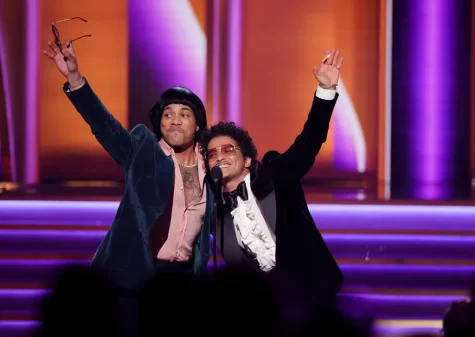 Anderson .Paak (left) and Bruno Mars (right) form the duo Silk Sonic, and they “swept” during the Grammys, which means that they won every award that they were nominated for.
