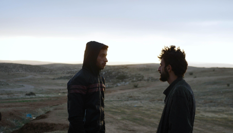 Palestinian director, Basel Adra shown with Israeli director, Yuval Abraham from the movie No Other Land.